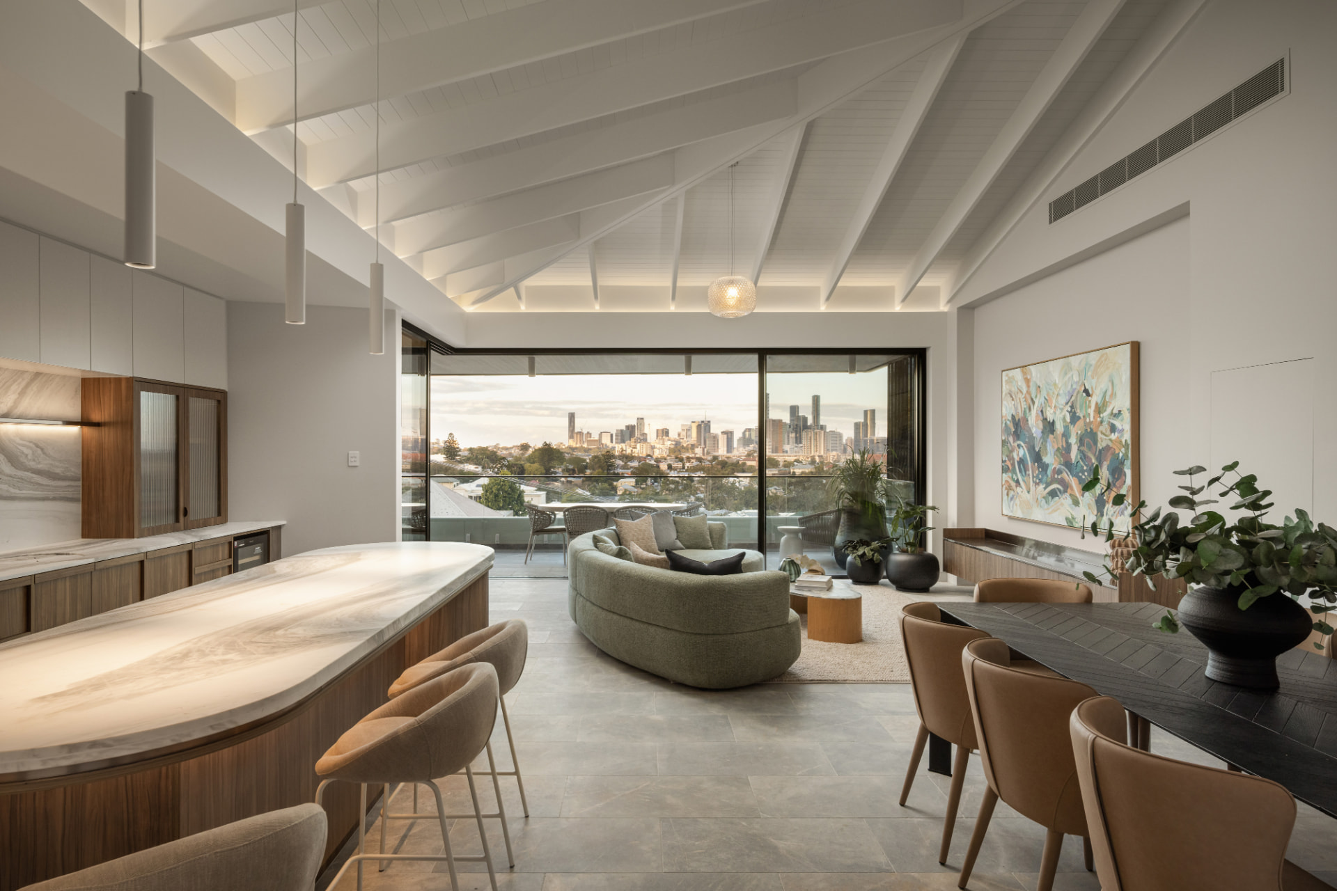 Open plan kitchen, living and dining with Brisbane skyline views