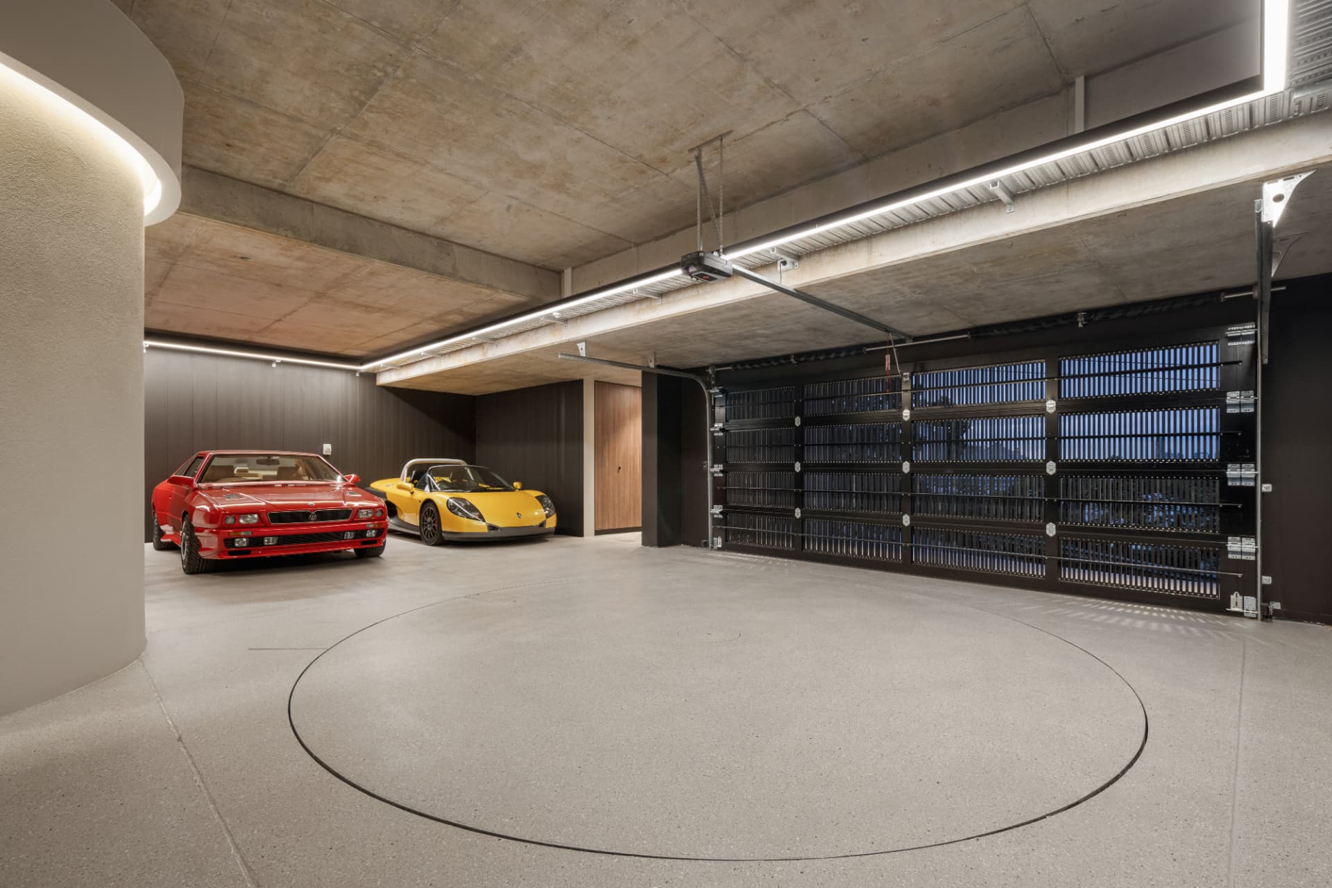 Basement showroom garage with car turntable