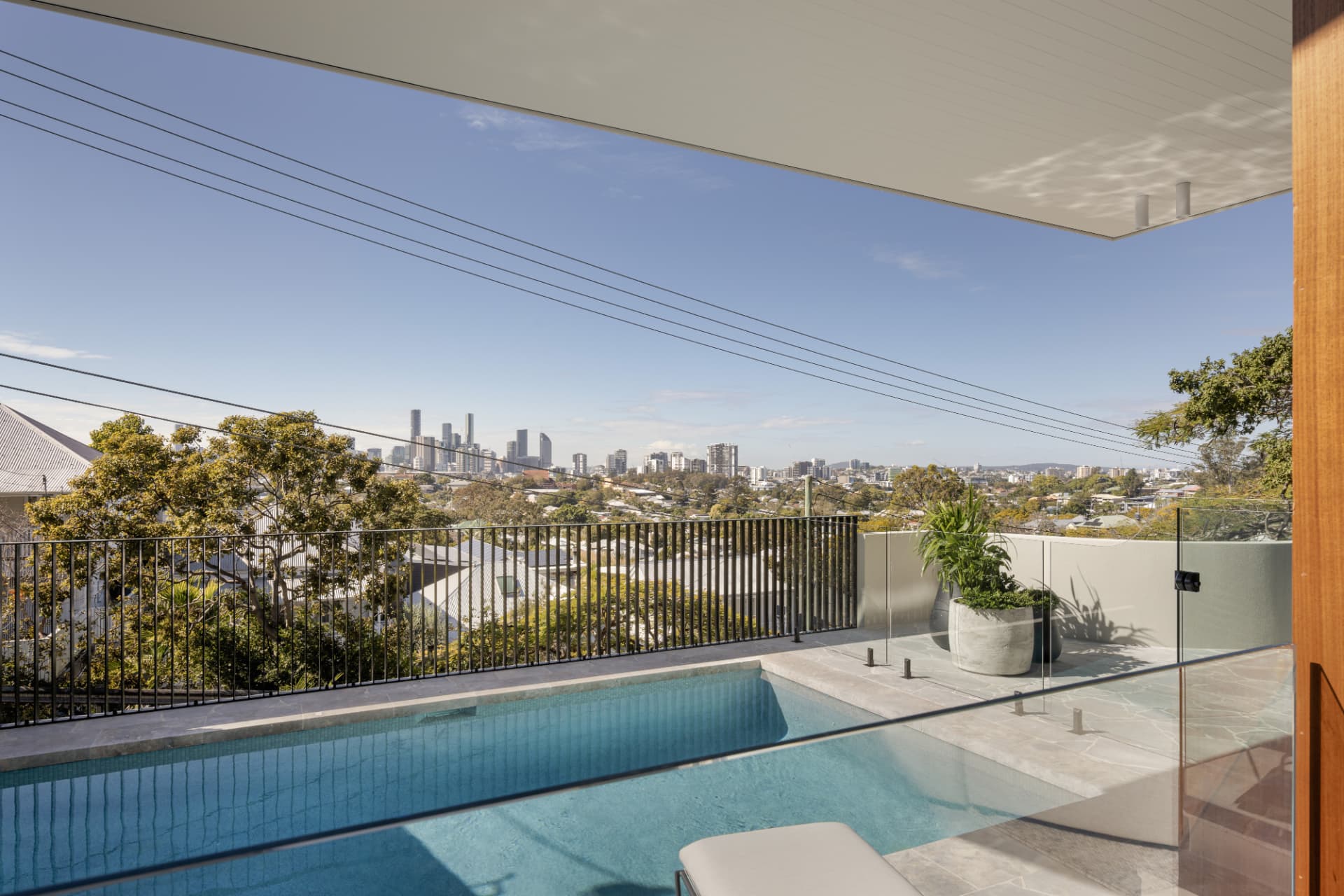 Elevated pool terrace overlooking Brisbane city